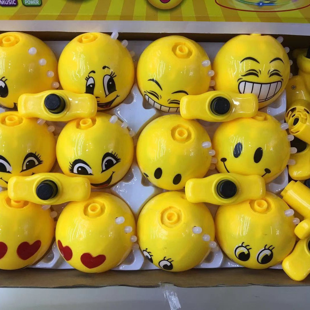 新款闪光七彩音乐陀螺弹跳炫彩发光笑脸按压式灯光夜市陀螺表情包