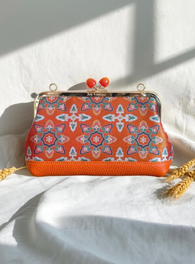 张和才步步升莲古蜀锦爱马橘牛皮包包，名家活力橙手提包