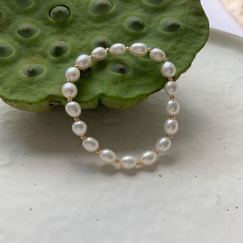 秀气椭圆925银手腕低调小金珠