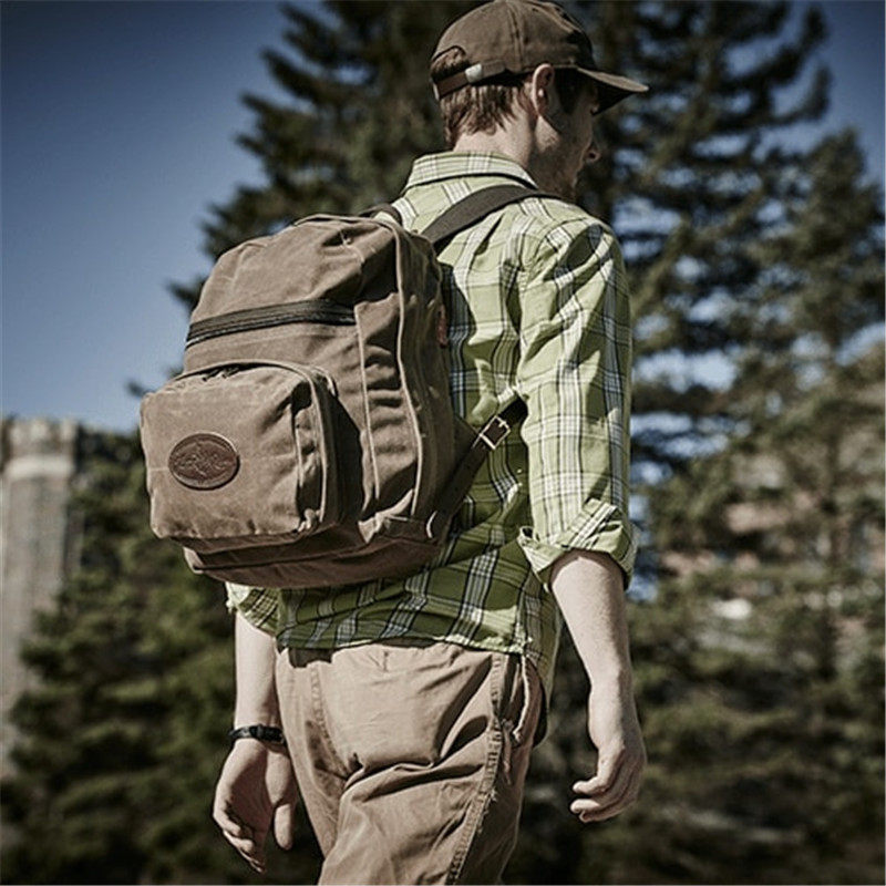 复古男士油蜡防水帆布包户外登山背包男女休闲双肩背包电脑背包