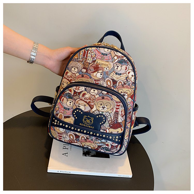 北包包2025新款双肩包女包百搭卡通小熊休闲帆布书包小众单肩背包