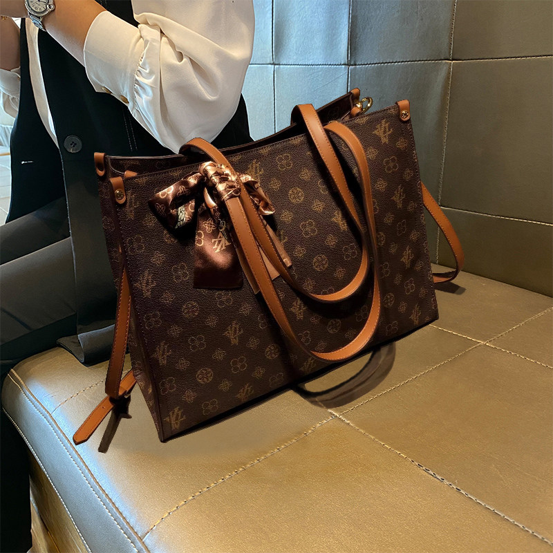 女士包包2025新款品牌大容量托特包真皮通勤高级感百搭单肩斜挎包