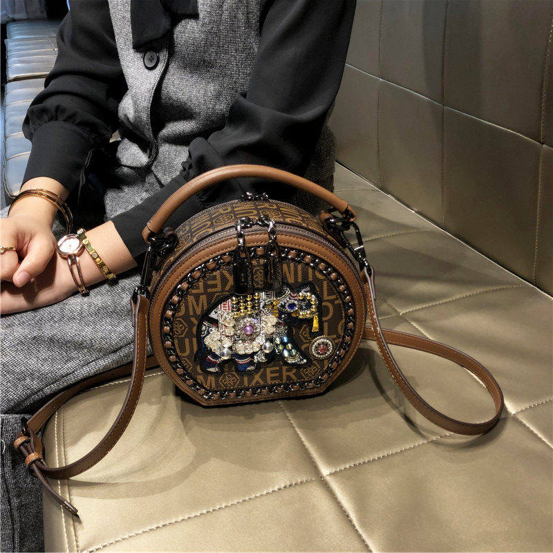 巨好看超火小众包包女款高级感精致双拉链小圆包女手提单肩斜挎包