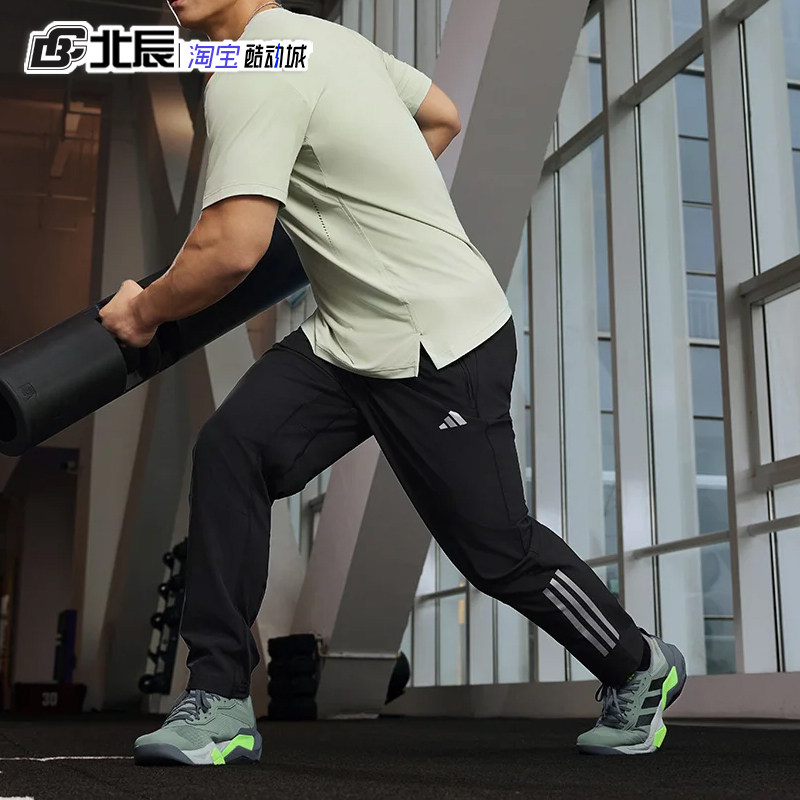 Adidas阿迪达斯男子户外健身运动裤综合训练梭织三条纹长裤IM7484