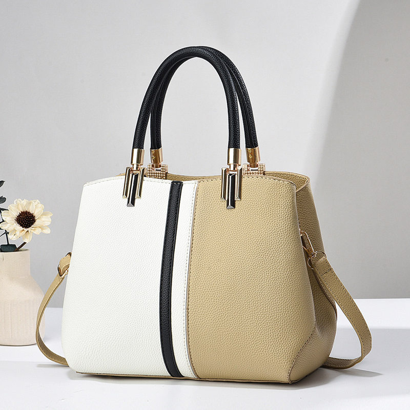 今年流行女包2026新款春夏拼接撞色韩版网红小方包通勤软面小包包