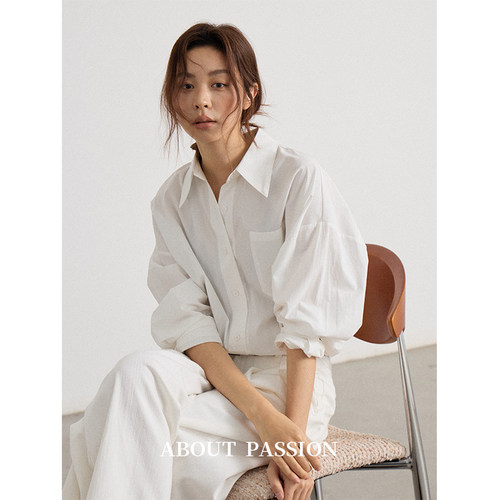 About Passion · 简约弧形下摆设计宽松衬衣