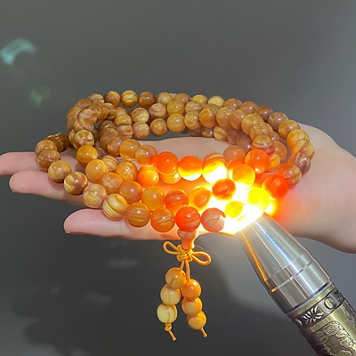 长白山琥珀木名族风透光全玉化