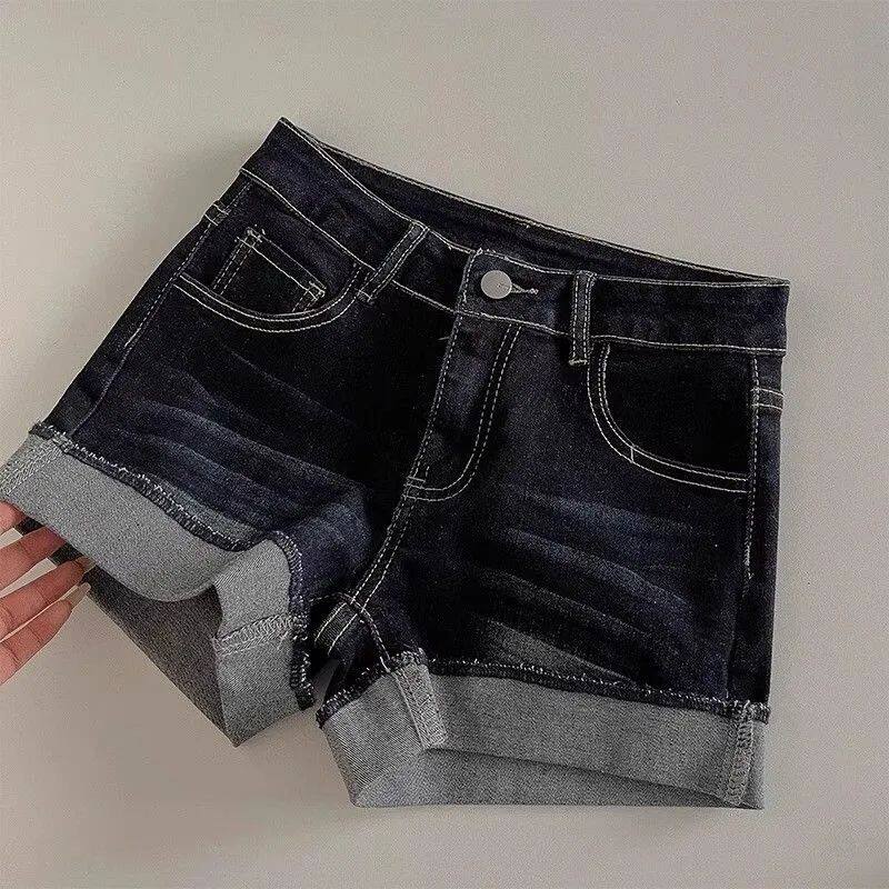 美式深蓝色设计感卷边牛仔短裤女夏季高腰性感超短包臀a字热裤子