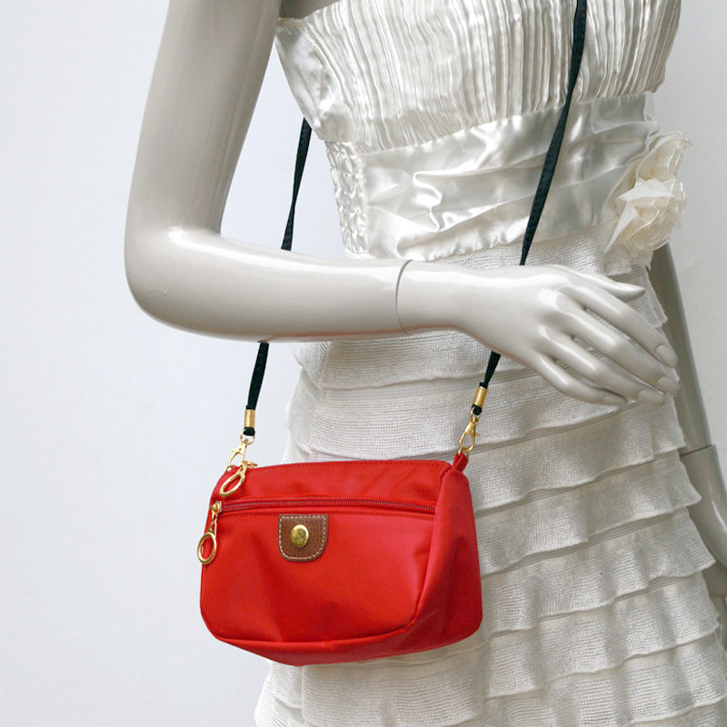 斜跨女包尼龙布手拿短款钱包女零钱钥匙大屏手机手腕小包袋运动