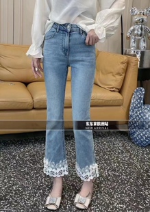 欧洲站仙仙立体镂空刺绣花朵蕾丝花边弹力时髦九分烟管牛仔裤春夏