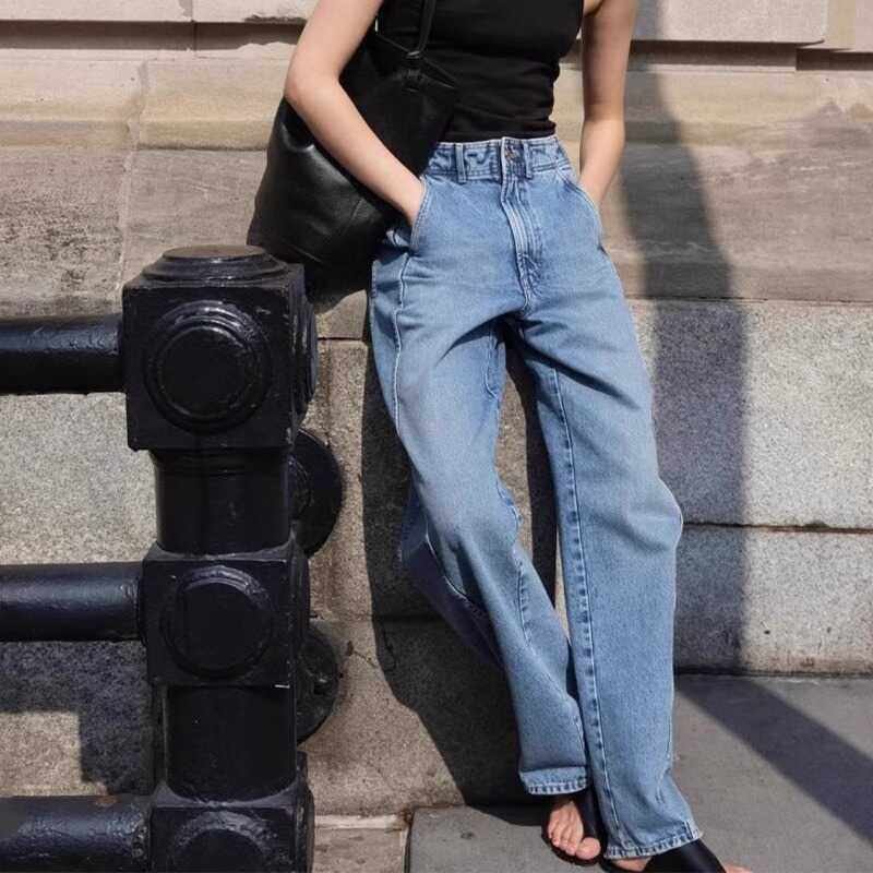 显高欧美风前移侧缝牛仔裤女弧形