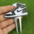 White and Black Shoes Green Fork