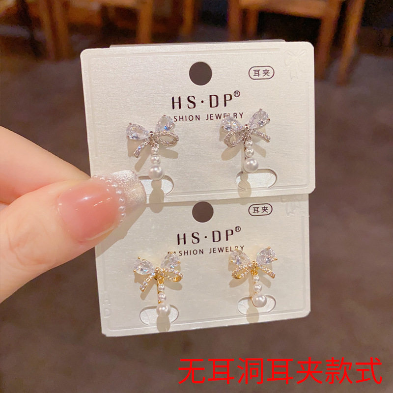 【999】银饰品2026日韩精致时尚甜美百搭锆石蝴蝶结珍珠耳夹气质