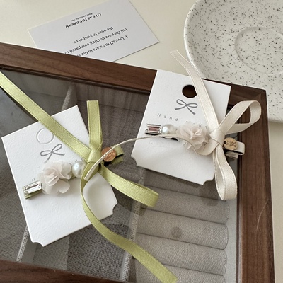 飘带蝴蝶结珍珠花朵发夹