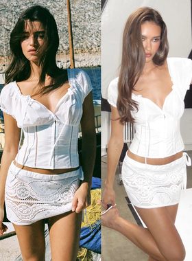 洛岛白玲 法式复古清新木耳系带泡泡短袖镂空花边修身甜辣小上衣