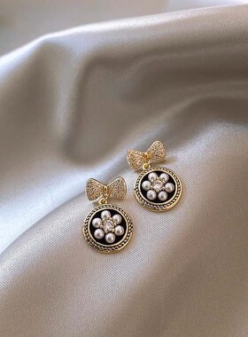 珍珠蝴蝶结耳钉女纯银针耳饰气质精致耳坠新款潮轻奢百搭小巧耳环