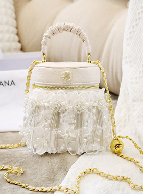CANA&KANA原创设计洋气仙女包花朵流苏水桶包包新款链条单肩斜挎