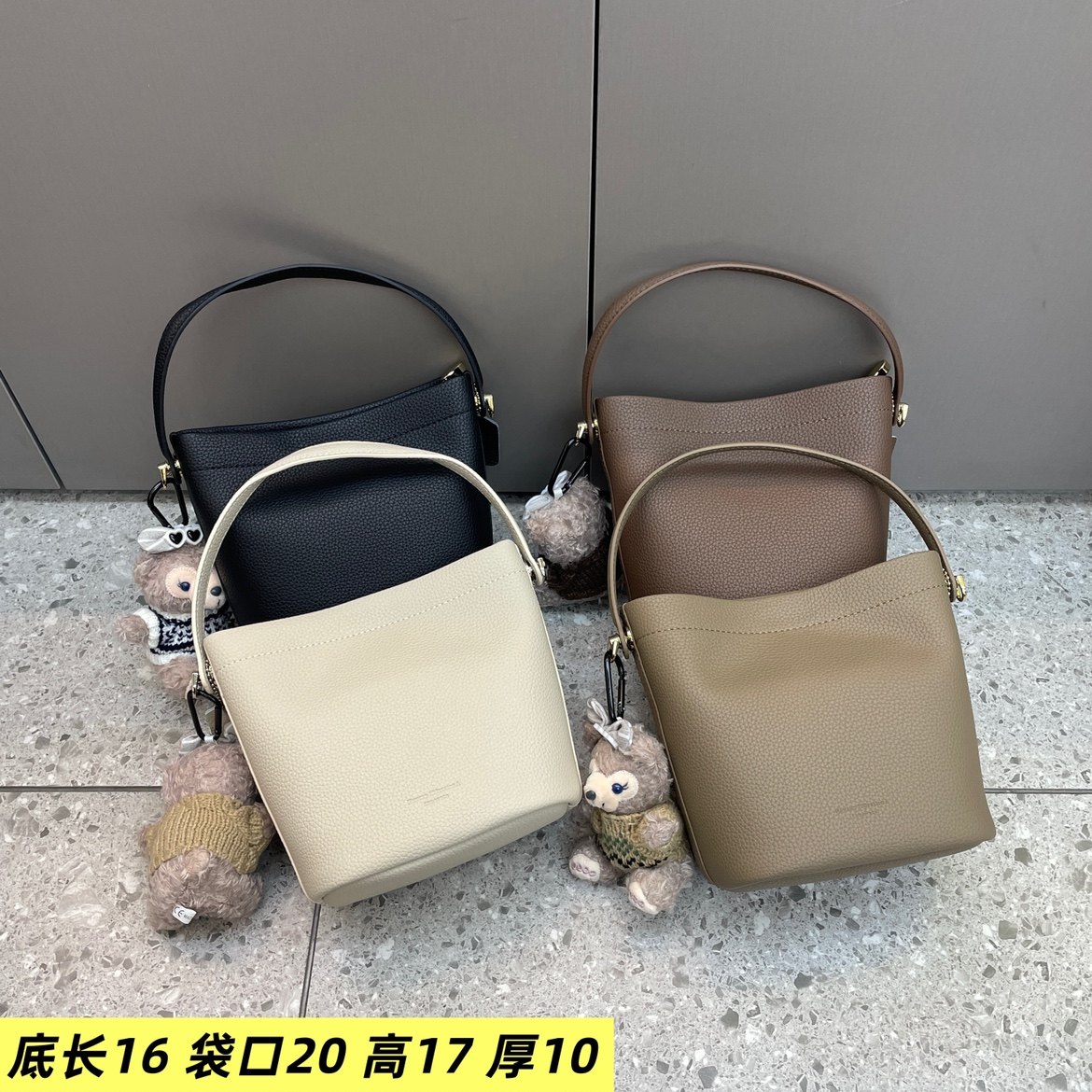 荔枝皮休闲小手提水桶质感女包2025新款小清新气质小众韩版斜挎包