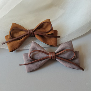 秋冬发夹女后脑勺2024新款高端简约蝴蝶结弹簧夹马尾夹半扎发顶夹