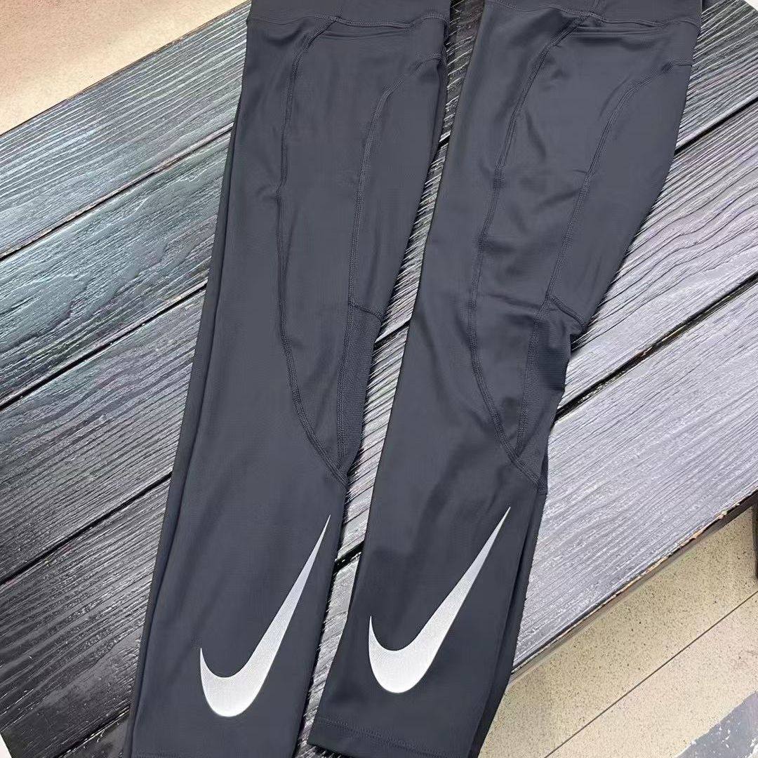 Nike耐克女子跑步紧身裤九分裤速干透气弹力修身有口袋DX0948-010