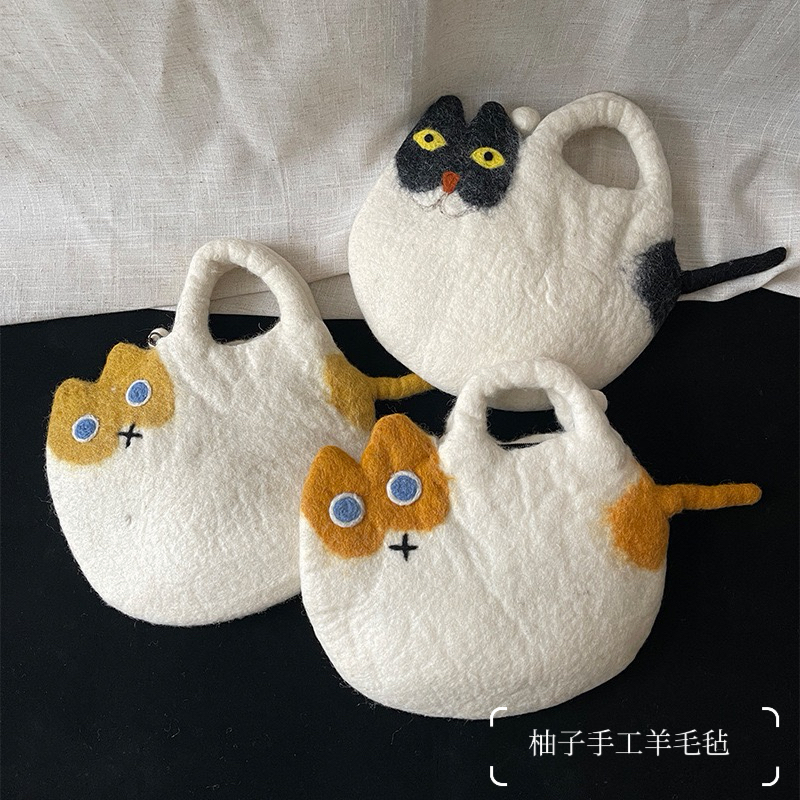 喵星人尼泊尔手工羊毛毡创意小猫咪手提包小众猫咪手工包包手拿包