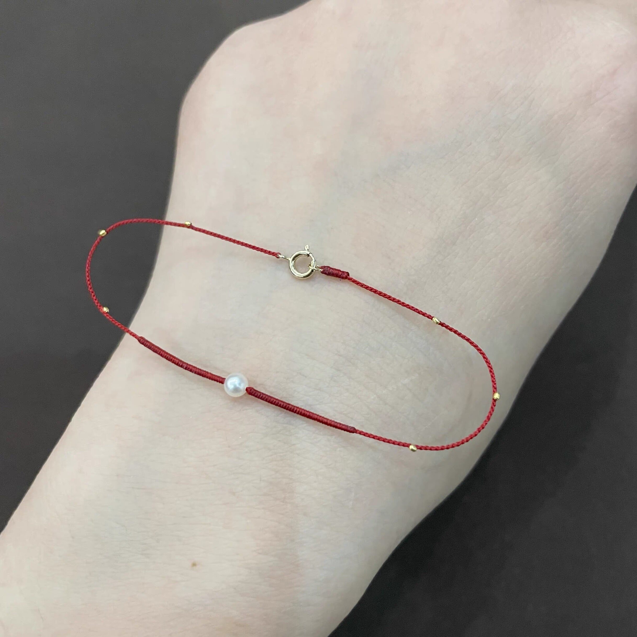 0.1mm极细编织金刚结红绳手链