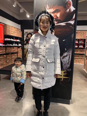 安踏女装冬中长款毛领运动羽绒服