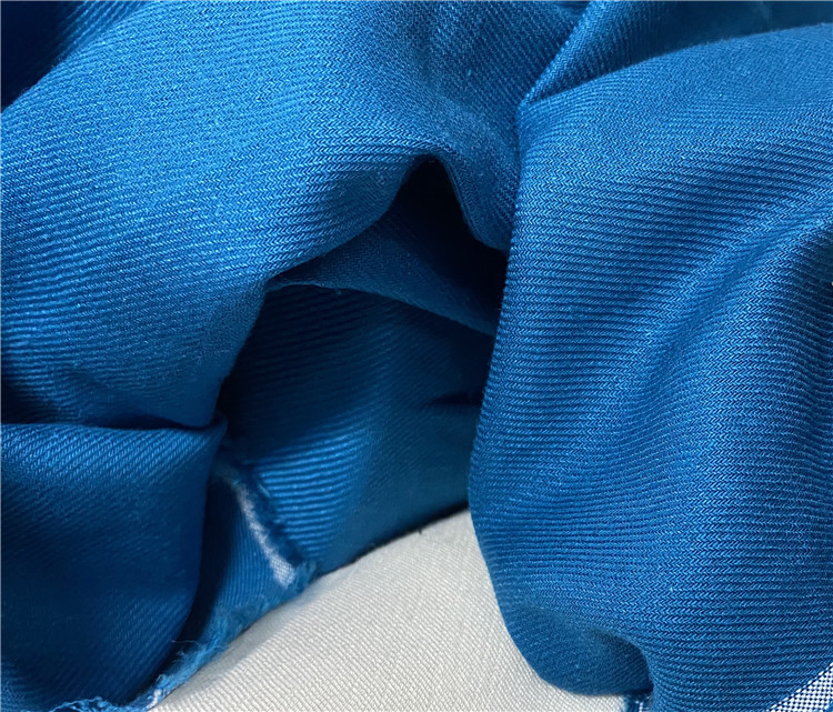 日本进口孔蓝色斜纹细腻温润亲肤棉麻面料设计师裤子套装布料