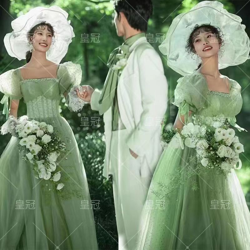 影楼主题拍照服装情侣写真摄影礼服外景拍照绿色泡泡袖长拖尾婚纱