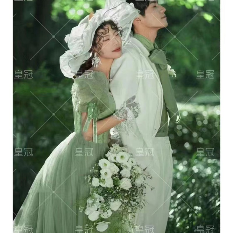 影楼主题拍照服装情侣写真摄影礼服外景拍照绿色泡泡袖长拖尾婚纱