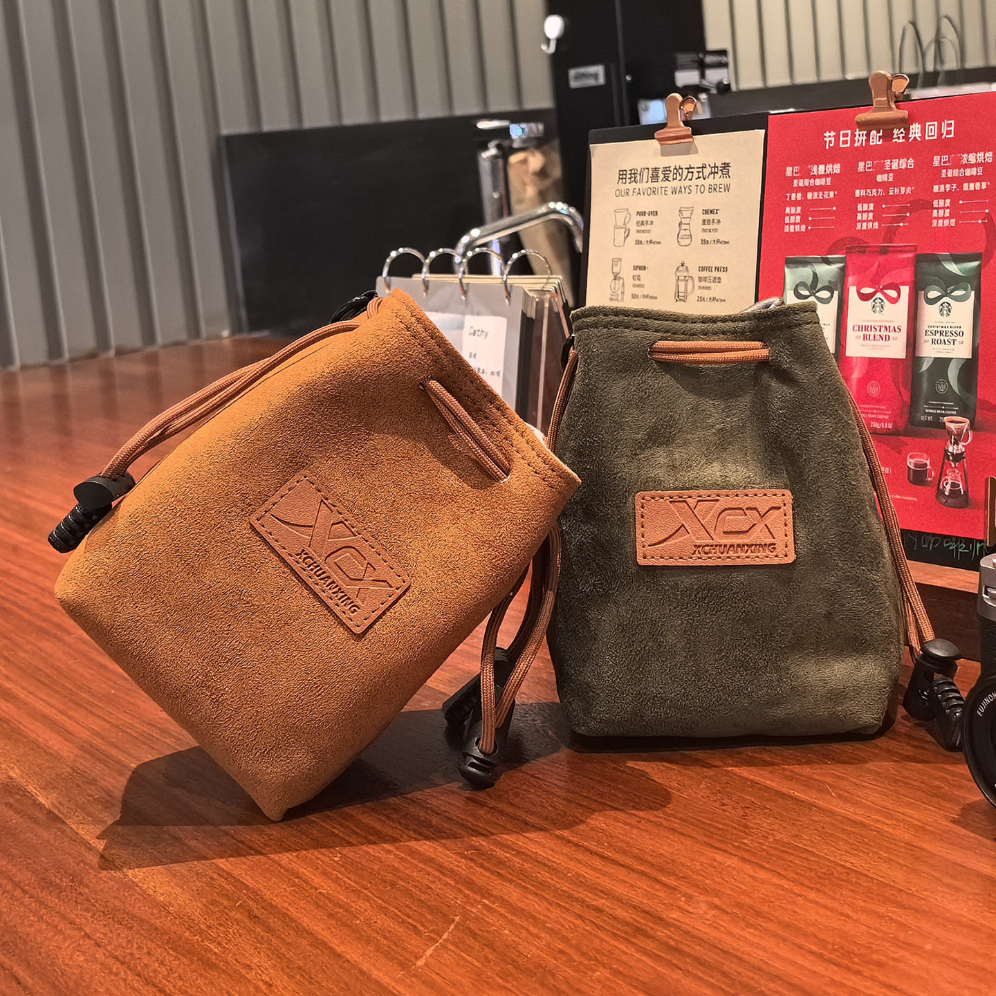 适用富士佳能R50索尼康收纳包复古反绒皮单肩包大容量抽绳相机包