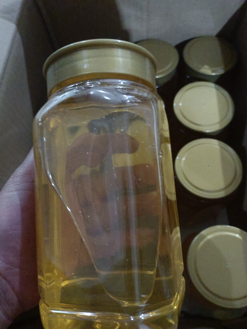 一瓶2斤本地江山坛石纯天然100%正宗洋槐蜜，零添加， 原汁原味