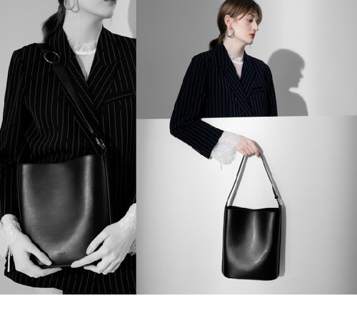 包包女2026新款托特水桶包宽肩带时尚百搭单肩手提斜挎纯色休闲包