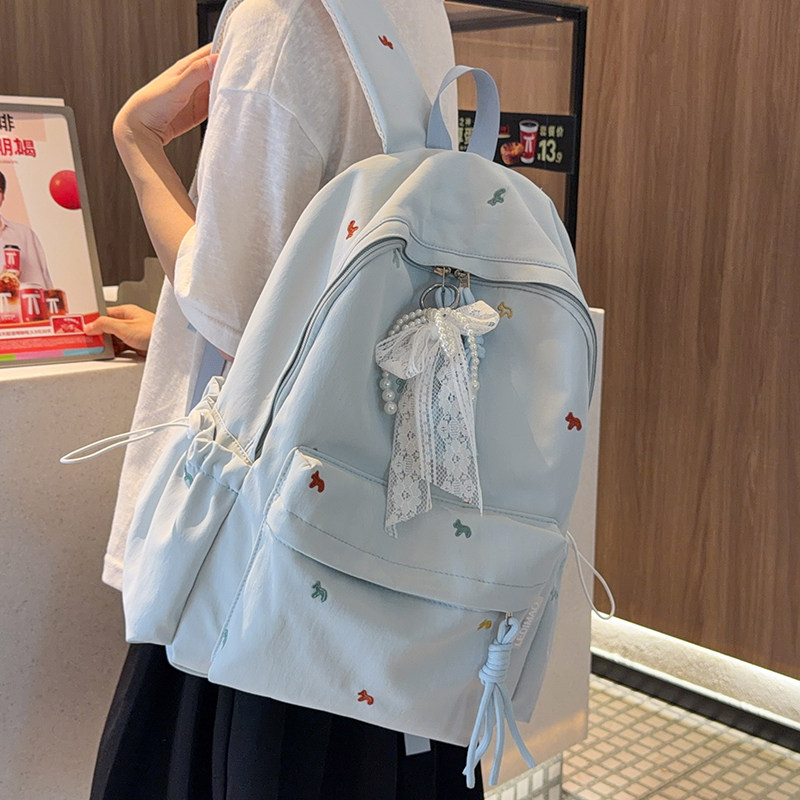 浅蓝刺绣小马双肩包女韩系初中生高中大学生书包高颜值学院风背包