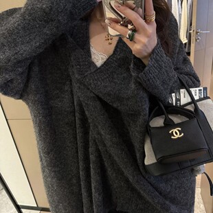 高级感简约老钱风不规则纽扣针织开衫女秋季新款韩版潮流宽松外套
