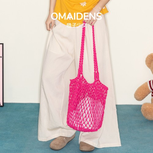 橙子少女镂空渔网编织单肩包度假