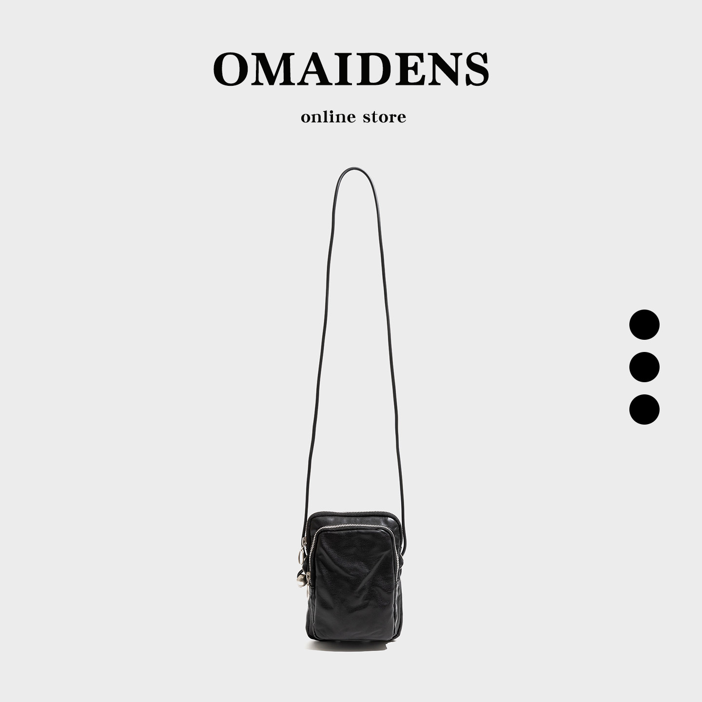 橙子少女小众设计黑色PU手机包男女通用竖款斜挎包简约百搭极简风