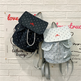 蝴蝶结波点束带双肩包女学院风大学生通勤书包小众休闲旅行小背包