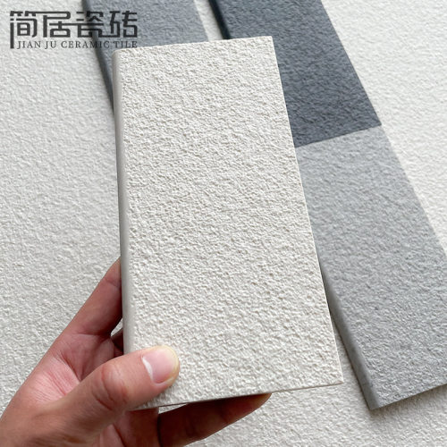 奶油色全通体荔枝纹麻面瓷砖别墅室外庭院子阳台广东佛山地砖墙砖