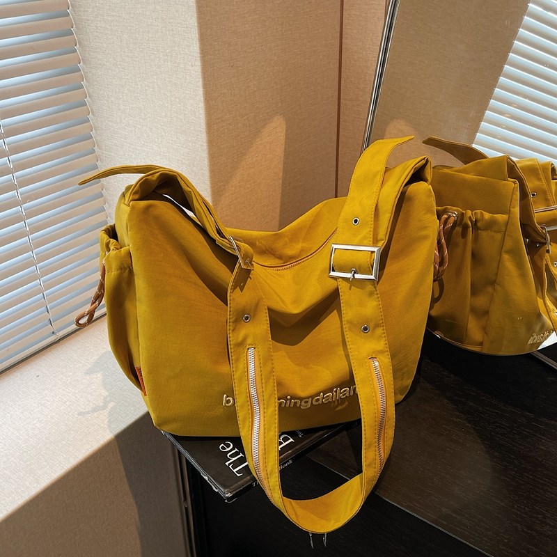 休闲帆布饺子包女大容量百搭单肩斜挎包2026新款轻便托特包旅行包