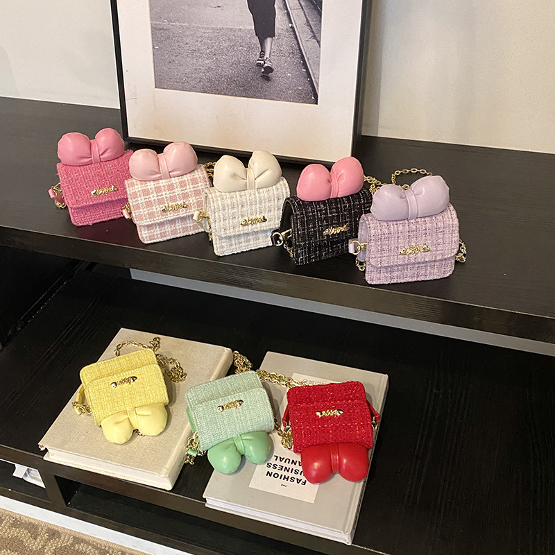 甜美蝴蝶结儿童包包爱心五金宝宝单肩包2025新款呢子小香风女童包