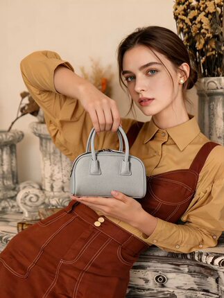 头层牛皮保龄球包包女2026新款高级感精致手提包单肩斜挎包枕头包
