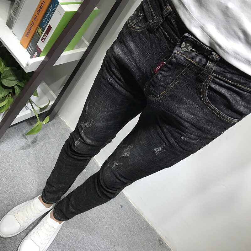 潮男春夏新款韩版黑黄贴标小脚超紧身牛仔长裤社会小伙快手红人爆