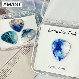 吉他拨片贝斯弹片礼物电吉他彩色热销颜色琴行批发树脂手工拨片