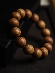 印度迈索尔老山檀香1.6爆满水波纹黑肉沉水老料佛珠手串男女款