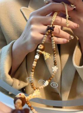 百香子搭配库克手机挂