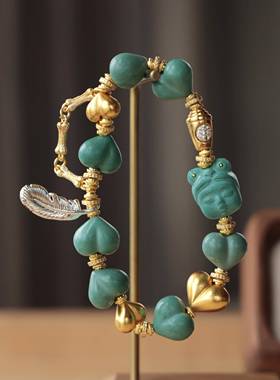 镁矿物屁桃嘟嘟嘴女孩纯铜配件屁桃羽毛佛头手炼文婉爱手炼