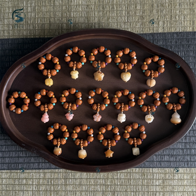 手工编织猴头小葫芦文玩隔珠