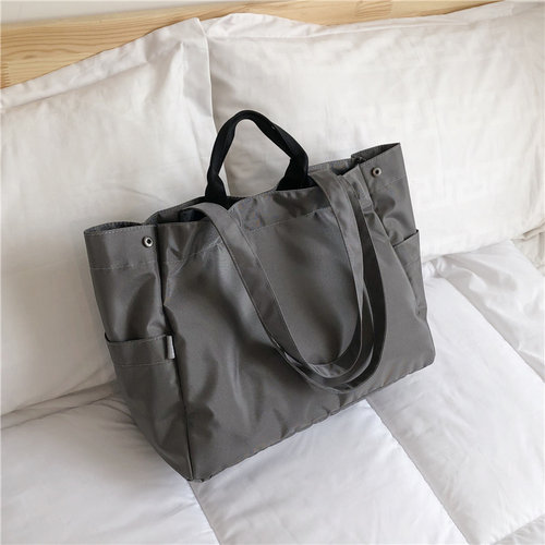 包包女新款装书防水大容量单肩包