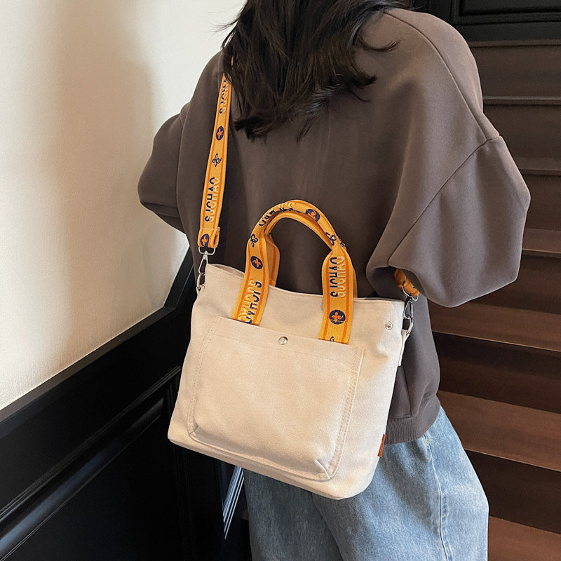 学生上课装书包女新款帆布小挎包轻便通勤斜挎包大容量手提单肩包